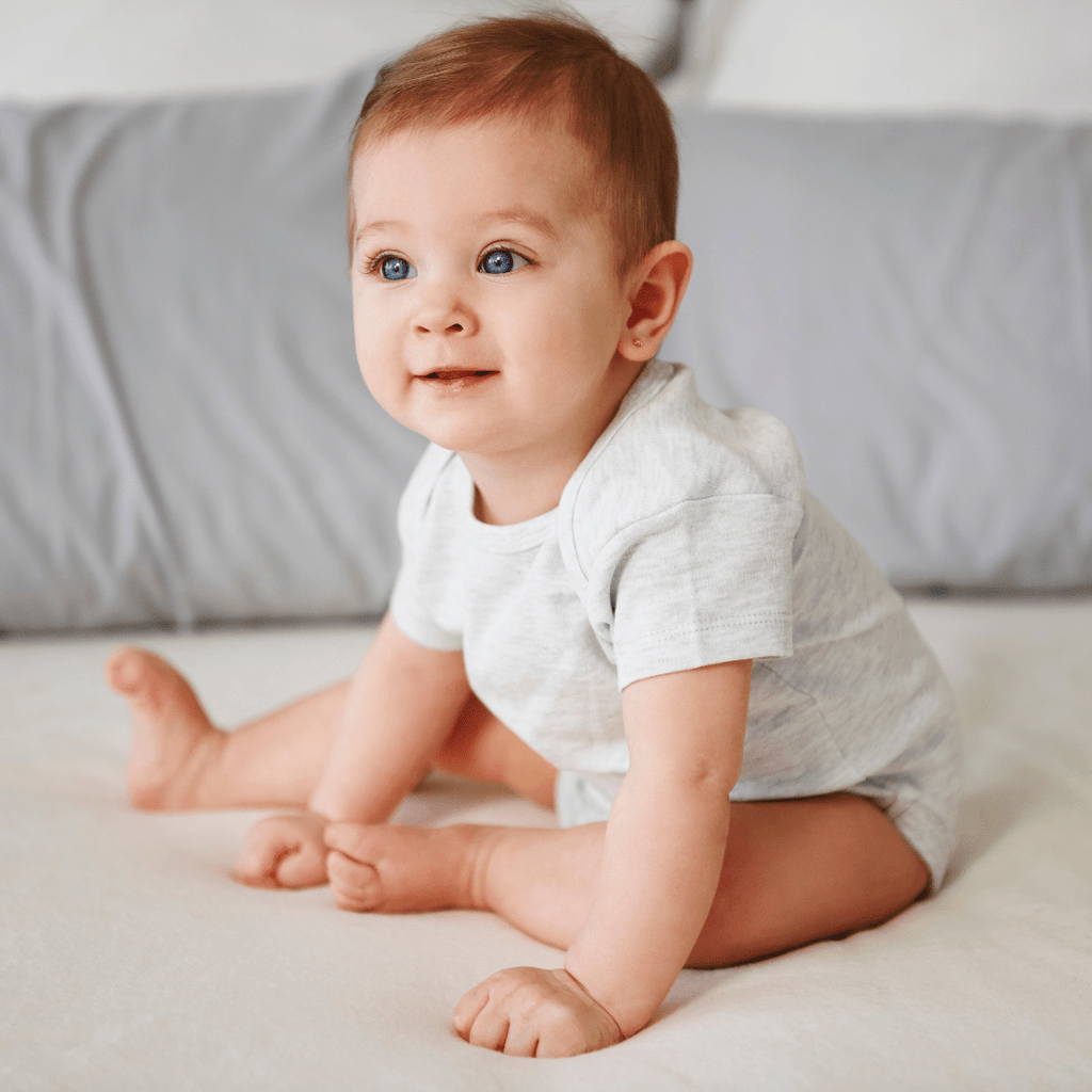 Nurturing Development: The Magic of Crawling and Sitting in Infants - Nurture Smart